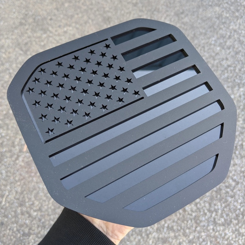 Ikonic 2019+ RAM 1500/2500/3500 American Flag Tailgate Badge - Matte Black on Gloss Black